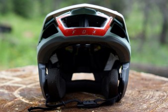 Front view of light blue and red Fox Dropframe Pro mountain bike helmet.