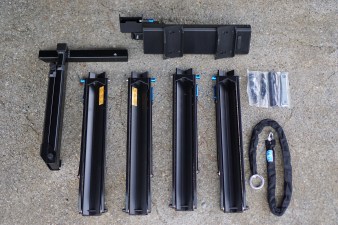 RockyMounts AfterParty Swing Away hitch rack pieces laying on the ground and ready for assembly.